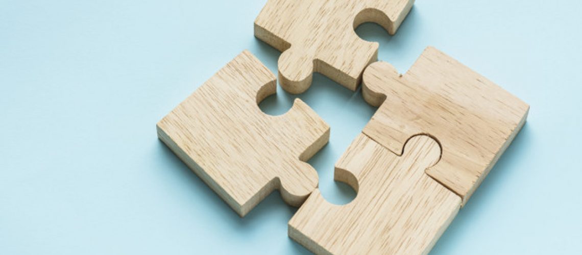 Jigsaw teamwork concept macro shot